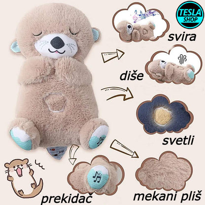 Meda koji spava diše svetli i svira uspavanke